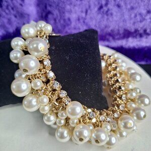 "Golden Siren" Pearl Dangle Bracelet with Knot Lock & White Stone Accents